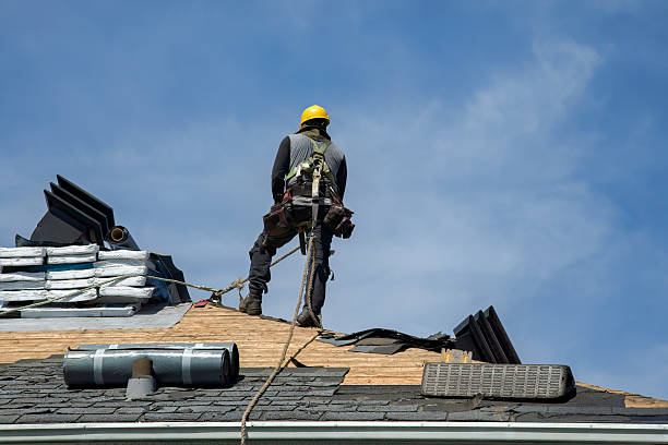 Professional Gutter Installation technician working in Tuskegee Institute, AL